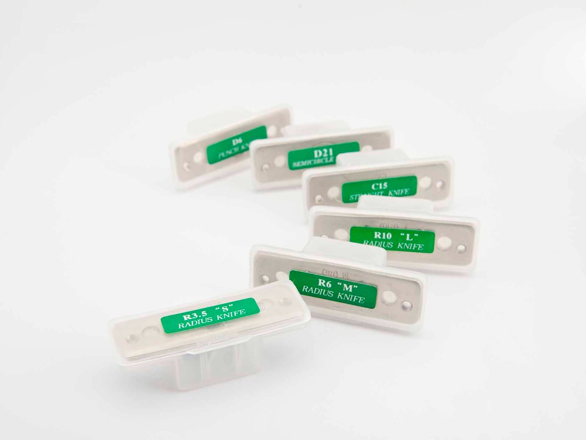 Six cutting dies for the 1200 in their boxes